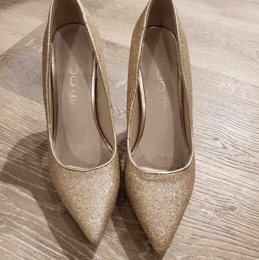 Gold shimmery pointed toe shoes